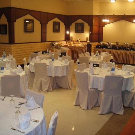 L'Arabia Hotel Apartments Abu Dhabi Restoran foto